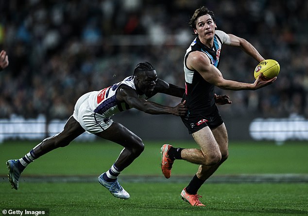 101338397-15012297-Port_skipper_Connor_Rozee_took_formal_action_when_a_rumour_about-a-14_17555587029.jpeg