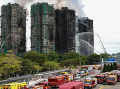 香港火災造成128人死亡,另有八人被捕