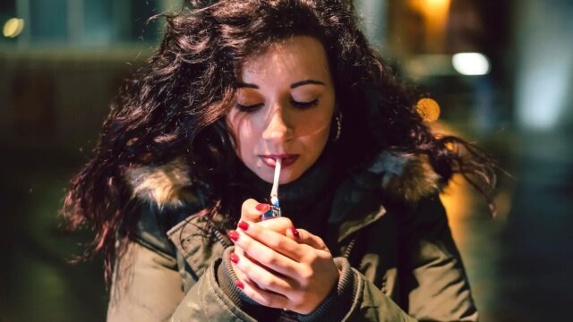 young-woman-smoking-cigarette.jpg