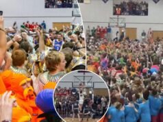 泰勒大學的球迷衝進籃球場,這是著名的“平安夜”聖誕節傳統的一部分。