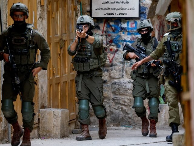 2026-07-25T145945Z_1836731780_RC21LMAKKUX6_RTRMADP_3_ISRAEL-PALESTINIANS-HEBRON-SETTLERS-1785069560.jpeg