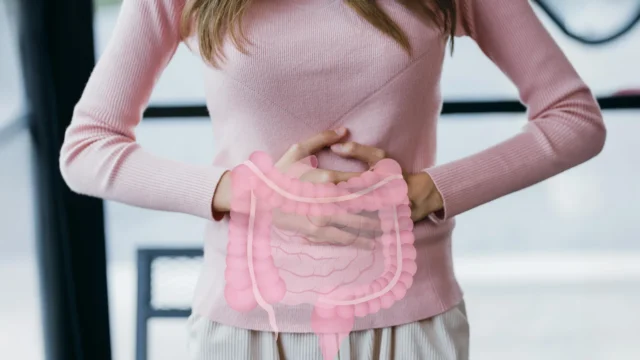woman-holding-stomach-digestive-gut-health.webp.webp