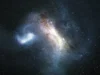 最早被食人银河“吞噬”的星系在其心脏留下了疤痕 This artist's impression depicts that collision between the Milky Way and LKH which occurred over millions of years.