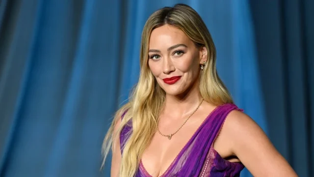 Golfer Hailey Ostrom is Team Sophie, Hilary Duff compares herself to LeBron & pig squealing contests! Hilary Duff posing on a red carpet at the Academy Museum Gala.