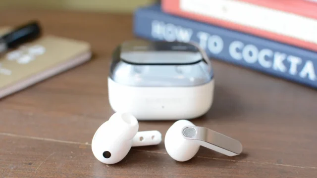 Samsung Galaxy Buds 4 Pro - earbuds in front of their charging case